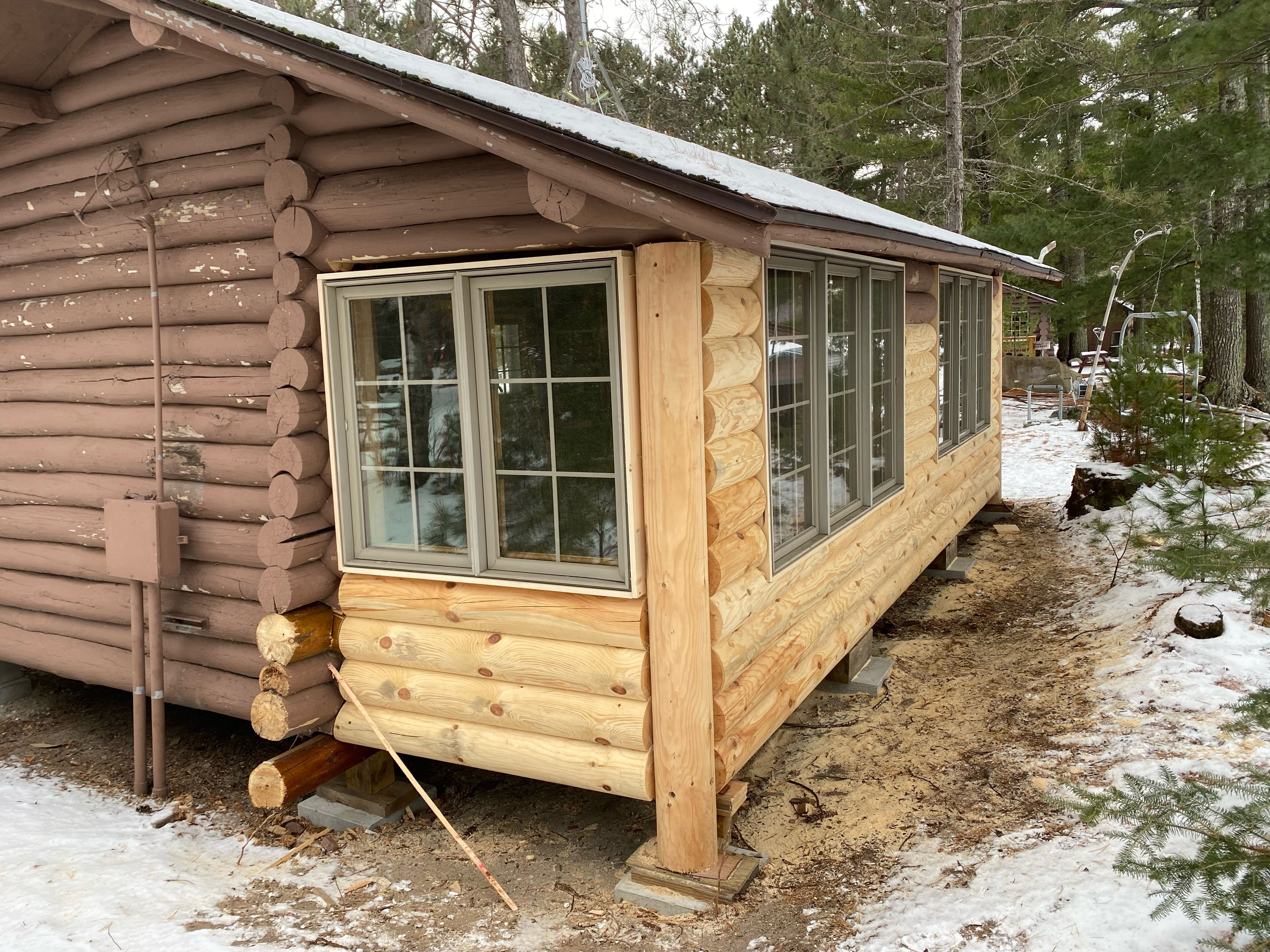 Winter 2021 - Journey's End (Cabin #2), sporting new windows & log work on its way to a complete rehab!