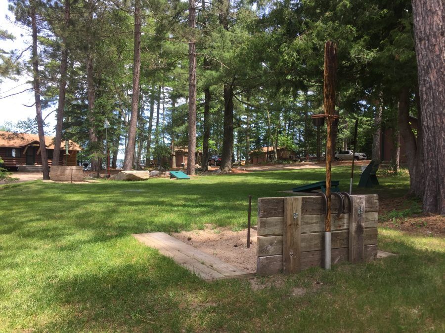 Corn hole and yard games at Cabin O' Pines Resort & Campground